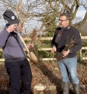 Two men preparing to plant trees in a Northamptonshire woodland